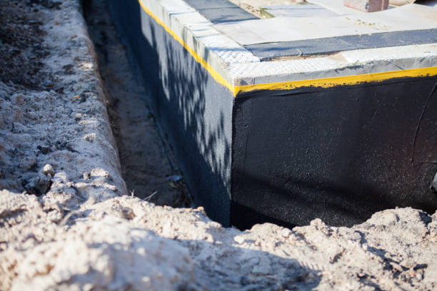 Professional Basement Waterproofing technician working in Palmyra, PA